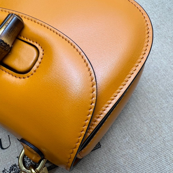 G*u*i mini top handle bag with bamboo
