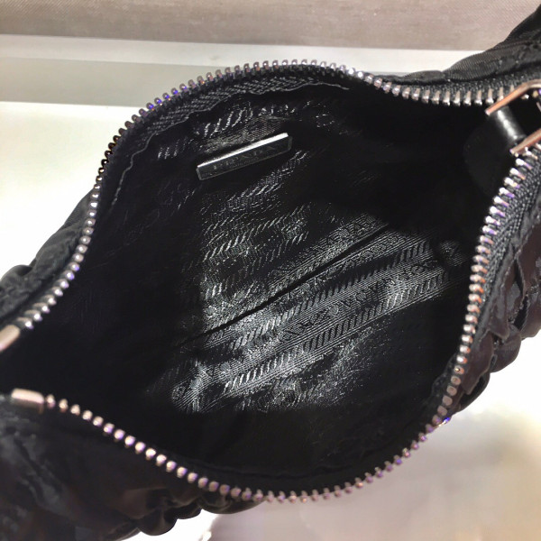 Pra*a nylon and saffiano leather mini bag