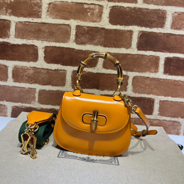 G*u*i mini top handle bag with bamboo