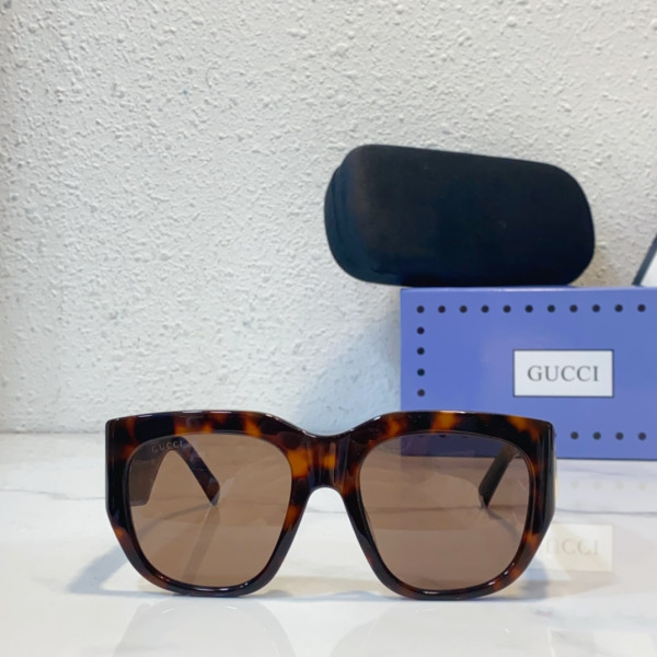 G*u*i sunglasses